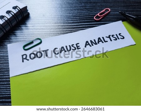 The writting root cause analysis on table background.