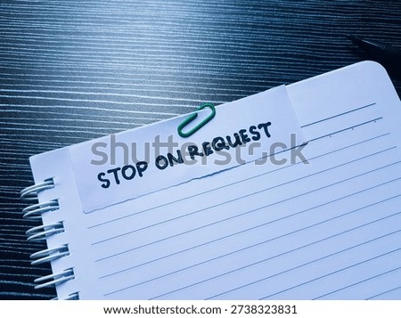 The writting stop on request on table background. 
