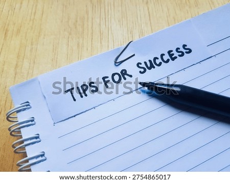 The writting tips for succes on table background. 