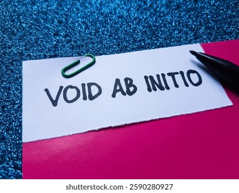 The writting void ab initio on blue background. 