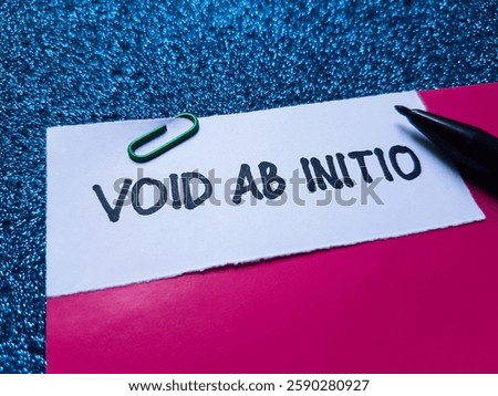 The writting void ab initio on blue background. 