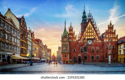 Wroclaw central market square with old houses and sunset. Panoramic evening view, long exposure, timelapse.  Historical capital of Silesia, Wroclaw (Breslau) , Poland, Europe. - Shutterstock ID 2195331585