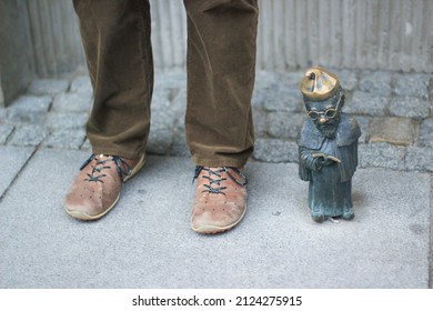 Wroclaw Gnome Next To A Man, Famous Sculptures In Polish City