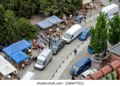 Wroclaw, Poland - April 2022: Wroclaw, Poland traditional local flea market high angle shot, group of people and market stalls seen from above. Local business, trade, swap meet, second hand goods