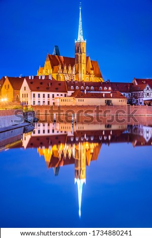 Wroclaw, Poland. Historical Cathedral Island in the Wroclaw old town with Oder River water reflection.