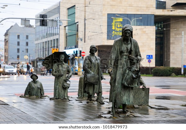 Wroclaw, Poland - January 07 2018: The Anonymous\
Pedestrians statue in Wroclaw, like a reminder that Poland was part\
of the communist past