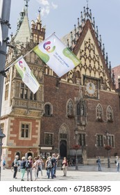 WROCLAW, POLAND - JULY 4th, 2017. The World Games Wroclaw 2017 Flags Waving On The Background Of Wroclaw's City Hall.