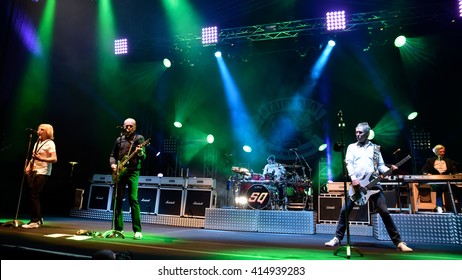 WROCLAW, POLAND - MAY 1, 2016: Status Quo Band During Concert Guitar Guinness World Record.