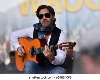 WROCLAW, POLAND - MAY 1, 2016: Al Di Meola during event Guitar Guinness World Record. Over 7 thousands guitarists achieve new Guiness Record playing Hey Joe by Jimi Hendrix.