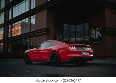 Wroclaw, Poland - September 3, 2022: Red Muscle Car Ford Mustang GT With 450 Horsepower And Rear Wheel Drive