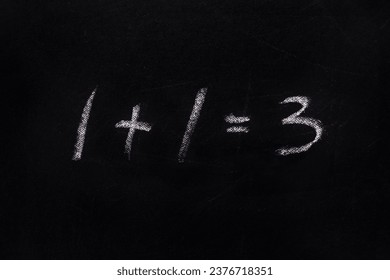 Wrong sum 1 1 3 written blackboard equation one plus one equals three written black board. Incorrect sum 1 plus 1 equals 3 writing chalkboard background. Buy two get one free. Simple math. Add. Sale - Shutterstock ID 2376718351