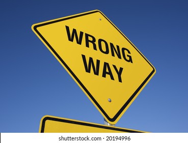 Wrong Way Yellow Road Sign Against Stock Photo 20194996 | Shutterstock