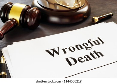 Wrongful Death report and gavel in a court.