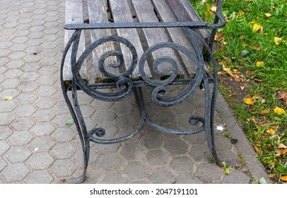 Wrought Iron Bench In The Autumn Park