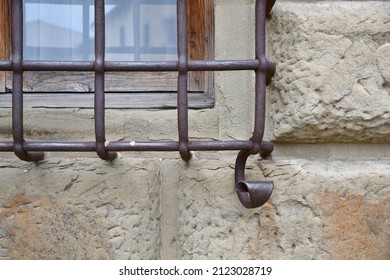 Wrought Iron Detail Of A Window Grate