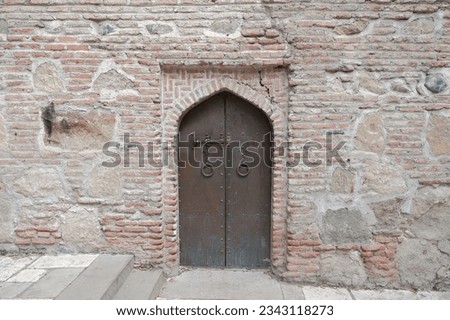 Wrought iron door. metal door in an old medieval temple. medieval background