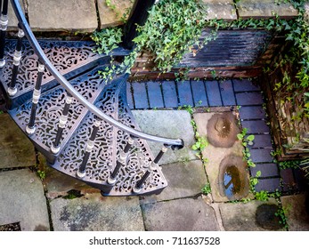 Wrought Iron Spiral  Staircase In The Backyard