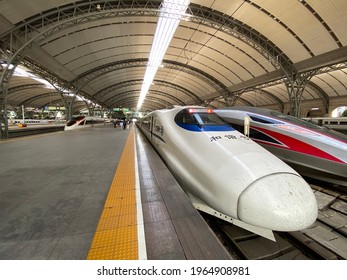 Wuhan.China-April 2021: Close Up Locomotive Of China Railway High Speed Train In Railway Station. Wide Angle And Perspective View.