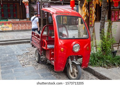 Wulingyuan, China-September 19, 2019 : Point Of View Small Truck Cargo Delivery Electric Logistic Vehicle Is The Low Price And Very Useful For Transfer Express Thing In Urban City At Hunan, China. 