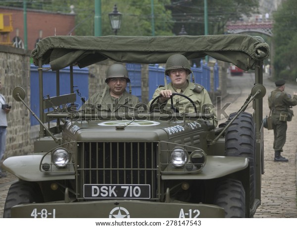 a WW11 American army jeep manned by\
enthusiasts at a 1940s day held at the National Tramway Museum,\
Crich, Derbyshire, Britain.taken\
05/10/2012