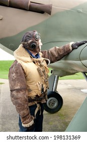 WW2 Fighter Pilot With Hurricane Aircraft