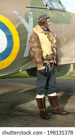 WW2 Fighter Pilot With Hurricane Aircraft