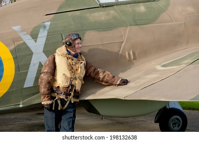 WW2 Fighter Pilot With Hurricane Aircraft