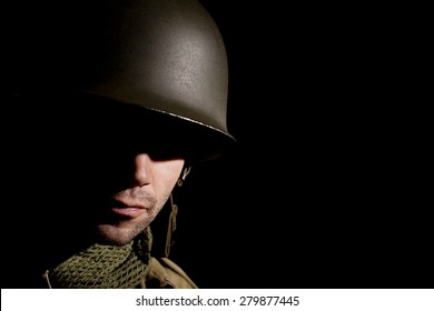 WW2 US Soldier With Face In Shadow