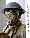 WWI soldier wearing a protective gas mask