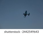 A WWII era SBD-5 Dauntless fighter plane in flight.