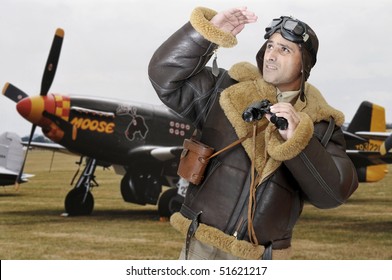 WWII Fighter Pilot With Goggles Looking To The Sky