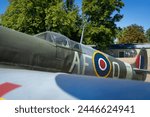 WWII Supermarine Spitfire fighter aircraft ground display at Duxford air museum, England.