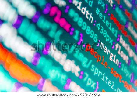WWW software development. Digital technology on display. PHP syntax highlighted. Web site codes on computer monitor. Programming of Internet website. Programming code on computer screen. 
