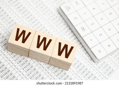 WWW Website Url Of Three Words On Wooden Cube Block, Minimal Background Concept For Internet Connection, Magnifier On Golden Background With Reflection.