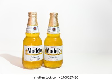 Wytheville, VA USA April 20, 2020 Two Bottles Of Ice Cold Modelo On A White Background. Modelo Is A Mexican Beer Imported To The United States.