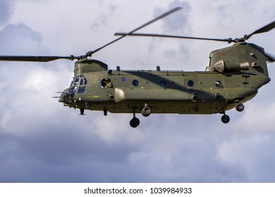 WYTON, CAMBRIDGESHIRE, UK – AUGUST 31, 2017: Royal Air Force 18 Squadron Boeing Vertol CH-47D Chinook HC2A ZH892 Flies Into RAF Wyton In Cambridgeshire.