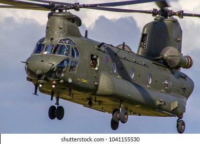 WYTON, CAMBRIDGESHIRE, UK – AUGUST 31, 2017: Royal Air Force 18 Squadron Boeing Vertol CH-47D Chinook HC2A ZH892 Kicks Up The Grass As It Flies Into RAF Wyton In Cambridgeshire.
