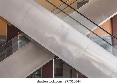 X Cross, Side View Of Escalator In Modern Office.