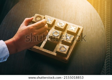 X O Games. wooden game board.