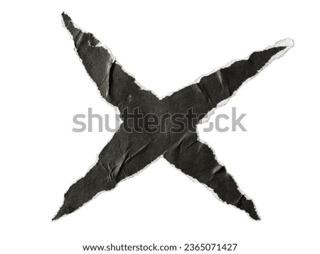 X shaped torn black paper on white background with clipping path
