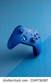 Xbox Controller Gamepad Levitating On Blue Background