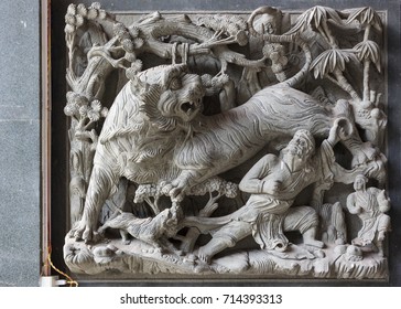 Xiamen, China - Feb 23, 2014: Stone Carving Of Wu Song Fights The Tiger