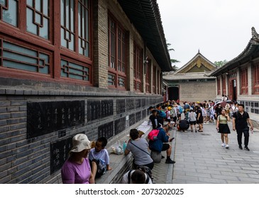 Xi'an, China - July 17, 2021: Pupils Copying Caligraphy In Stele Forest Or Beilin Museum, Xi'an, Shaanxi, For Steles And Stone Sculptures Of Chinese Caligraphy, Paiting And Historic Records.