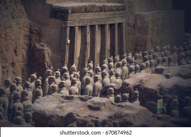 Xi'an, China - May 27, 2017: Lines of clay statues of ancient chinese warriors, guards of Qin Shi Huang emperor, so called Terracotta Army