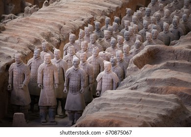 Xi'an, China - May 27, 2017: Lines Of Clay Statues Of Ancient Chinese Warriors, Guards Of Qin Shi Huang Emperor, So Called Terracotta Army