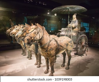 XIAN, CHINA - October 8, 2017: Famous Terracotta Army in Xi'an, China. The mausoleum of Qin Shi Huang, the 1st Emperor of China contains collection of terracotta sculptures depicting the armored men.