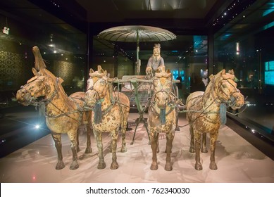 XIAN, CHINA - October 8, 2017: Famous Terracotta Army in Xi'an, China. The mausoleum of Qin Shi Huang, first Emperor of China contains collection of terracotta sculptures of armored men and horses.