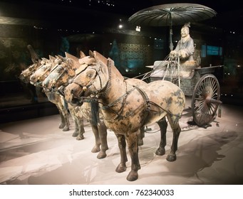 XIAN, CHINA - October 8, 2017: Famous Terracotta Army in Xi'an, China. The mausoleum of Qin Shi Huang, first Emperor of China contains collection of terracotta sculptures of armored men and horses.
