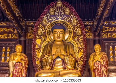 Xian, Shaanxi Province / China - August 4th 2015: Golden Buddha statue at Giant Wild Goose Pagoda in Xian, China