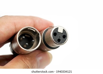 XLR connector for microphone cable isolated on white background isolated on white background.